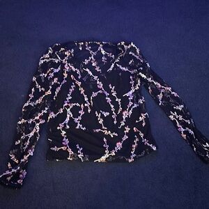 White House Black Market blouse with tank top underneath it